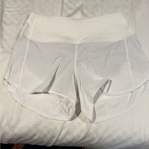 Lululemon Athletica White Athletic Shorts with Back Zip Pocket. Size 6
